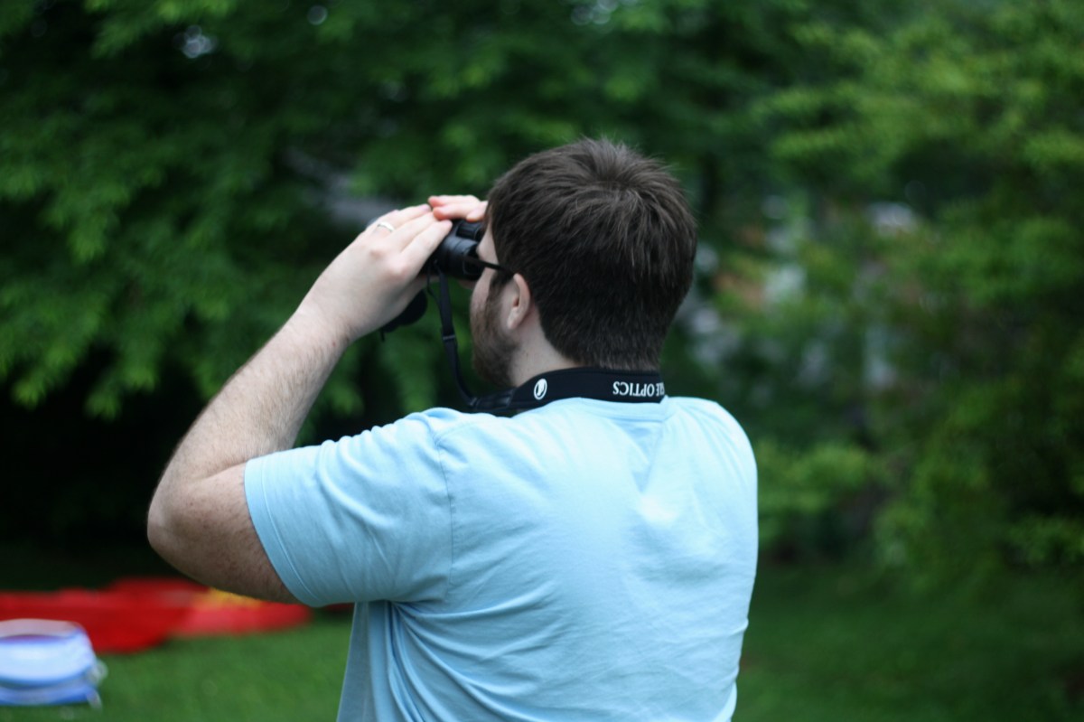man with binoculars